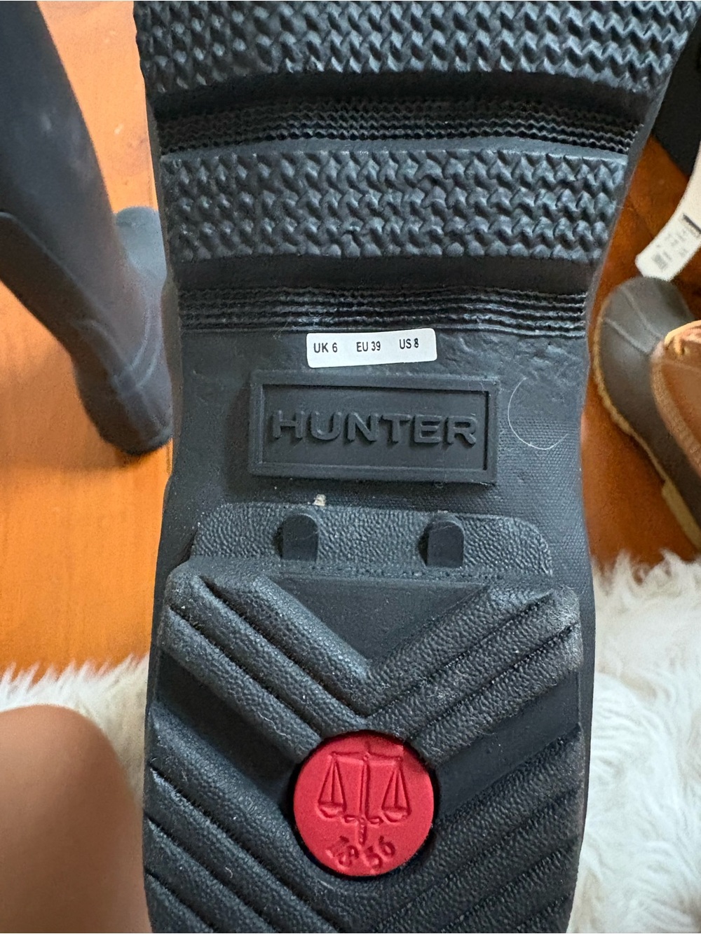 Hunter Men’s Black Rain & Snow Boots with Red Sole Accent